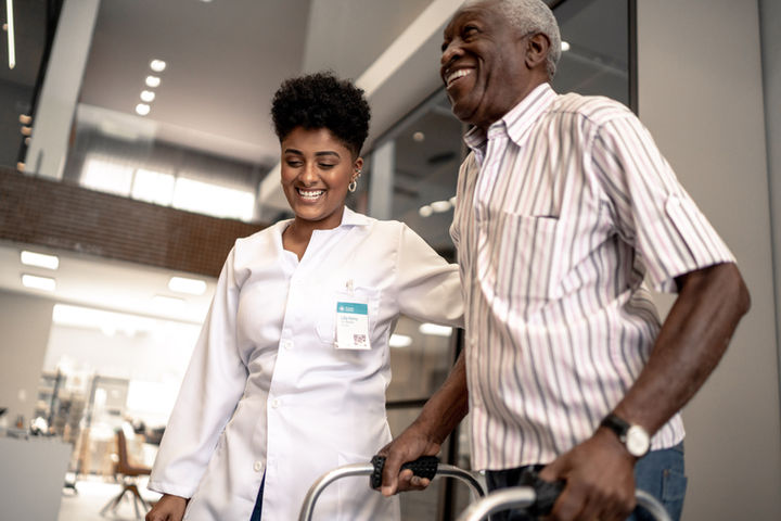 Senior walking with a walking aid